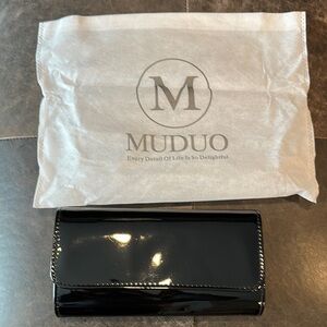 Like New: Muduo Black Patent Leather Wallet. Only used a few times